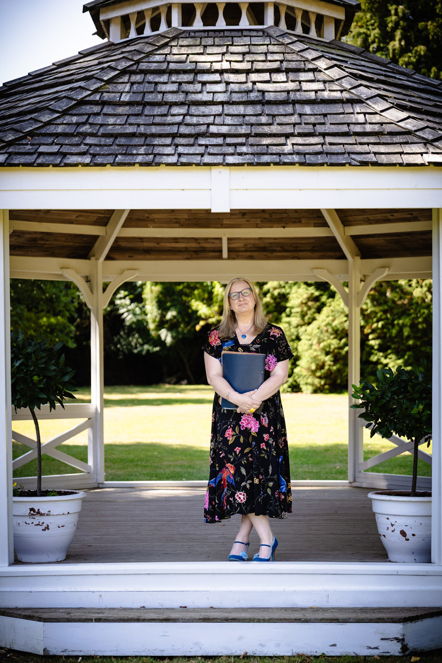 Deb Reed Celebrant Essex Colchester posing with arms out smiling.